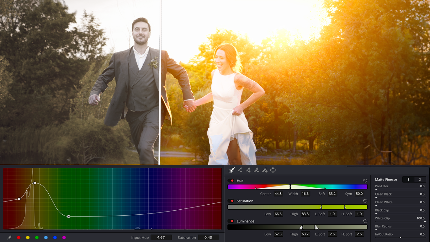 A couple walks together in a park during golden sunset hour with a digital color spectrum overlay at the bottom.