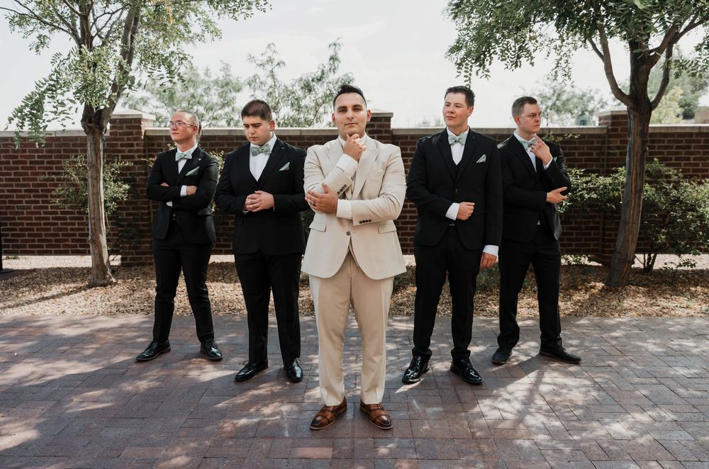 Groomsmen in formal attire strike playful poses in a series of outdoor wedding photos.