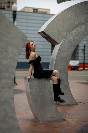 girl posing on concrete art