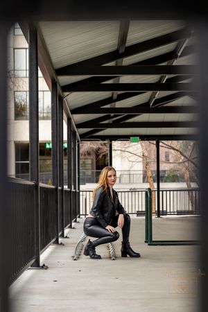 girl posing in covered bike rack area