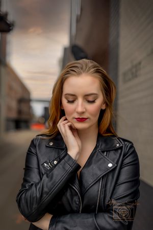 close up image of woman looking down