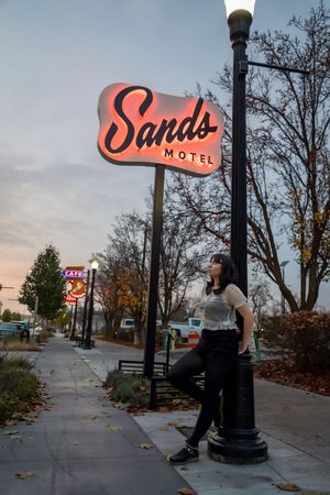 Downtown Boise Senior girl with neon signs