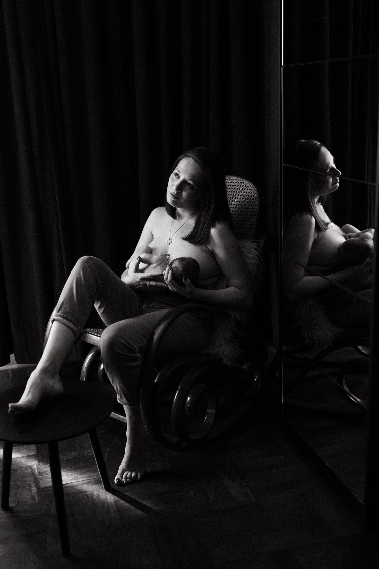 Artistic series of shadowy figures in intimate poses against dark backdrop.