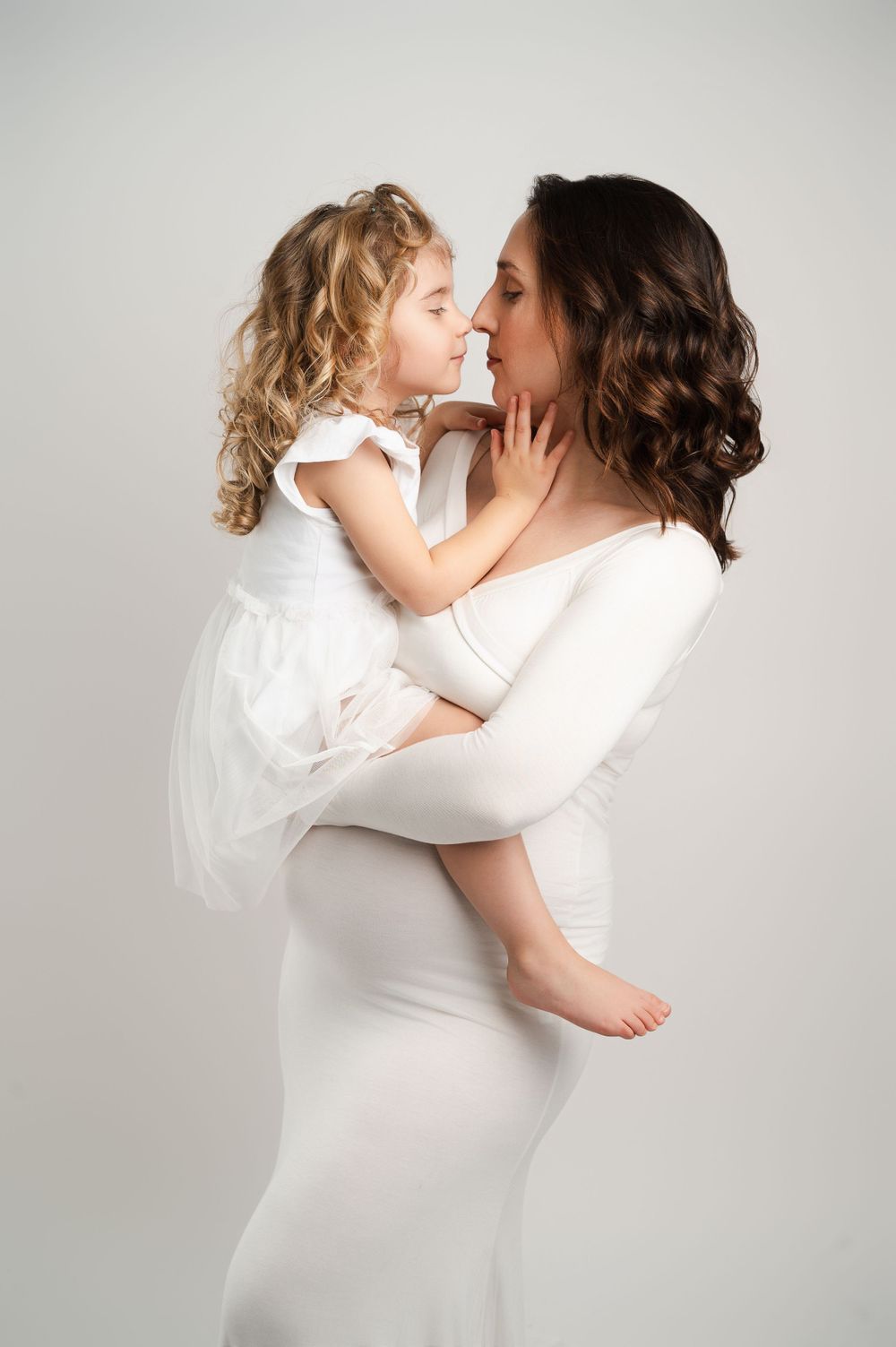 mae grávida e filha