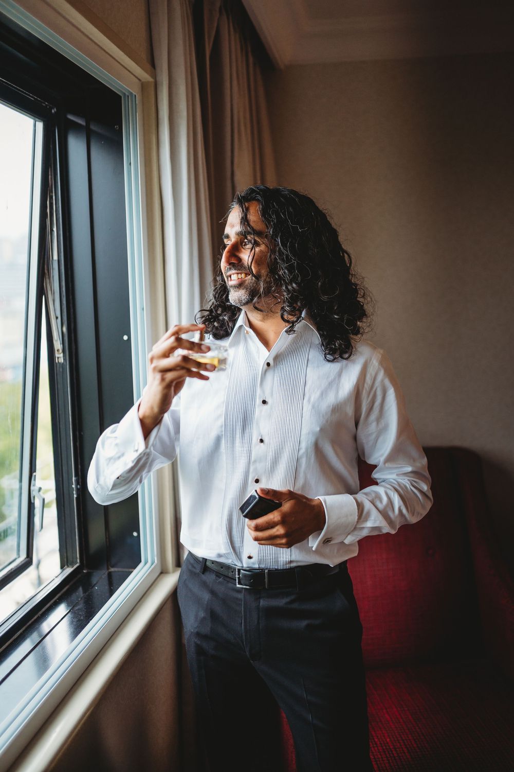 Series of photos showing someone in formal attire drinking from a glass by a window.
