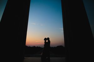 Romantic sunset engagement at Lincoln Memorial in Washington, DC—perfect lighting and timeless love captured in silhouette.