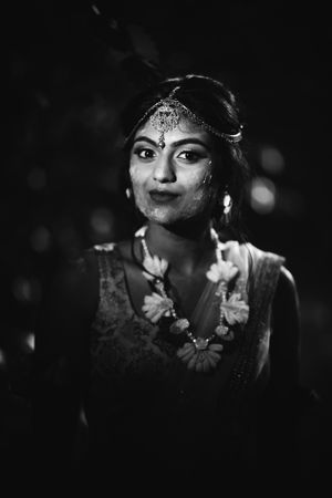 Elegant South Asian bride at Hilton Parsippany captured in a dramatic black and white portrait during her Indian wedding ceremony.