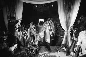 Joyful Indian wedding ceremony at Sheraton Parsippany Hotel, NJ, with vibrant traditions and family celebrations in full swing.