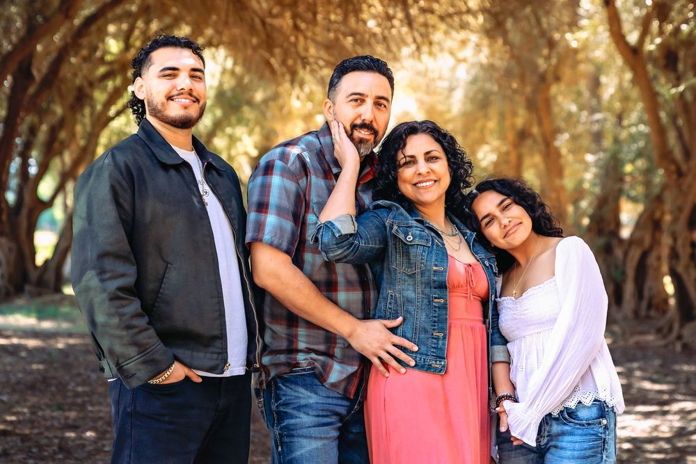 family photo captured of loving family near clovis,ca by colibri captures.