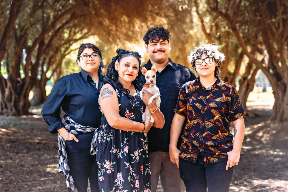 family photo captured of loving family fur baby included near sanger,ca by colibri captures.