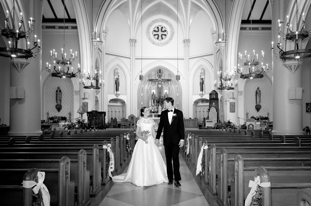 Black and white photographs of a traditional church wedding ceremony with classic architectural details.