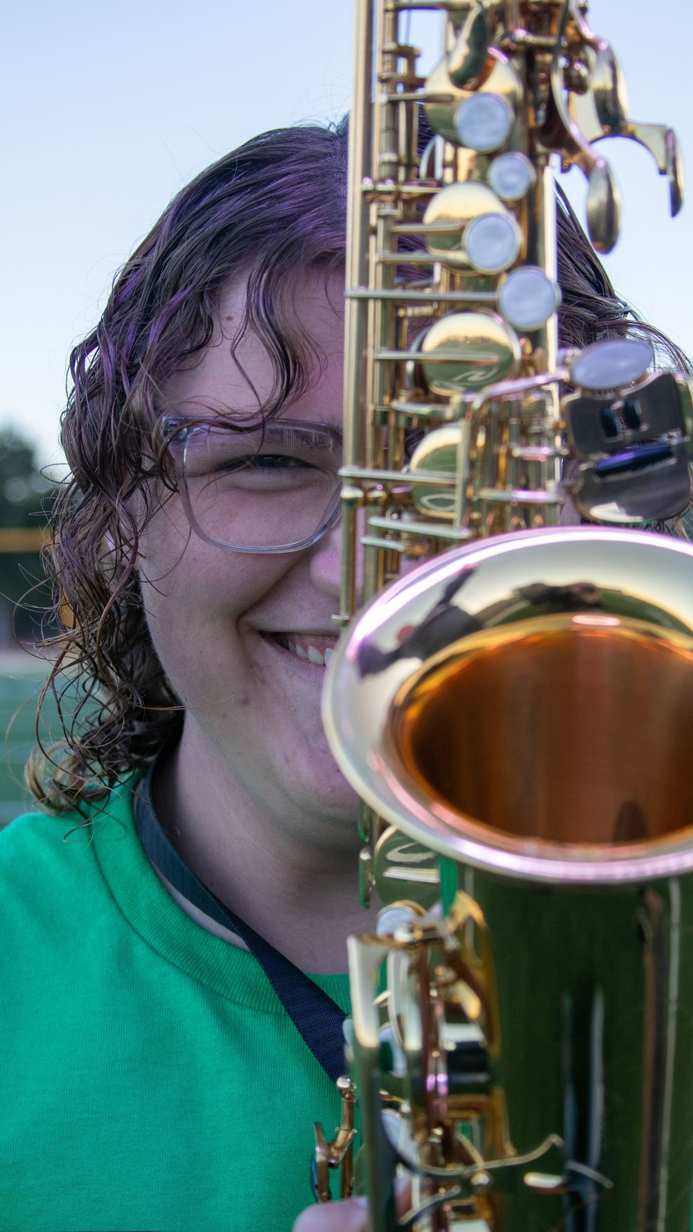 Close-up of teen boy with saxophone during a lifestyle senior session
