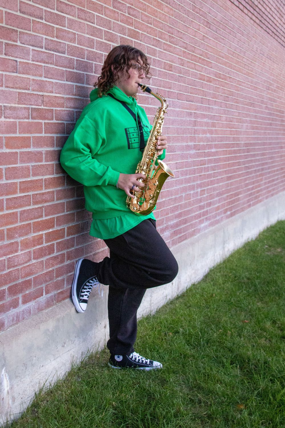 Teen boy posing outdoors during a senior portrait session in Utah