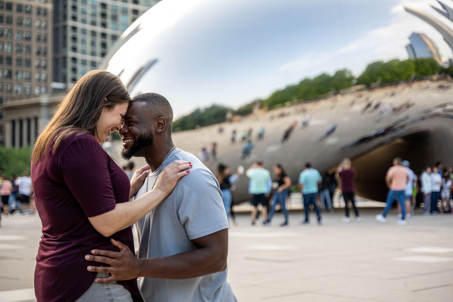 A couple shares tender moments in an outdoor photoshoot sequence across multiple beach and urban settings.