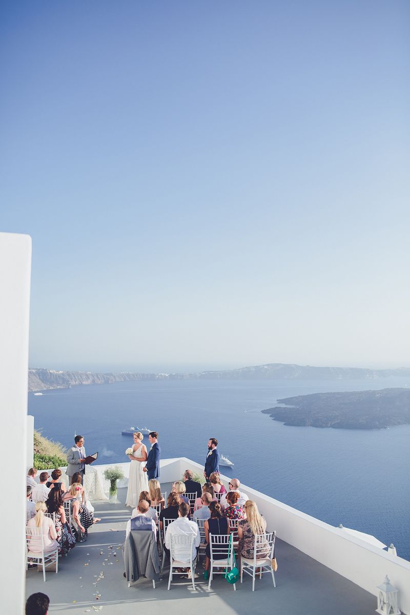 Wedding ceremony at Grace Santorini overlooking the Aegean Sea
