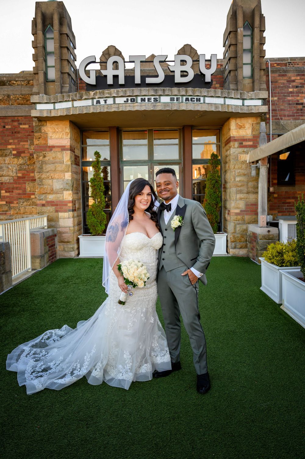 At GatsbyJones Beach, Long Island, with a vintage bride and groom portrait by Deja Vu Studios