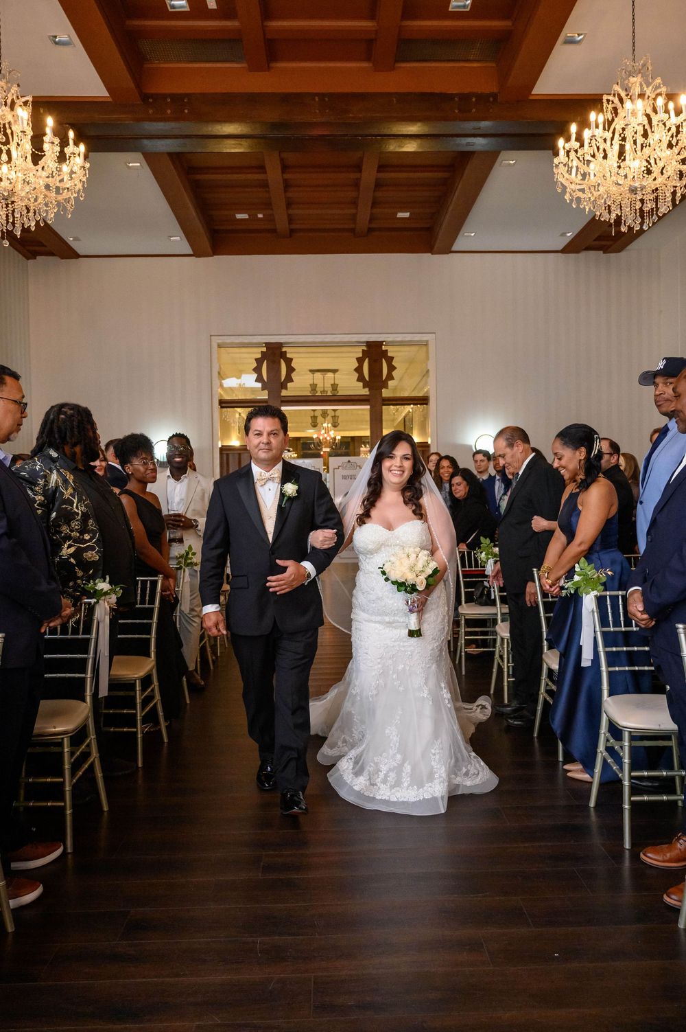 Gatsby-inspired wedding at Jones Beach Long Island by Deja Vu Studios featuring a vintage bride and groom portrait, elegant reception moment