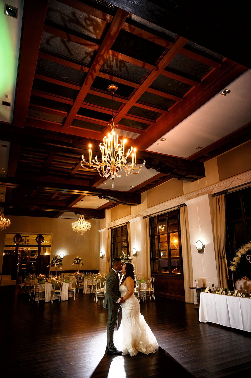 At GatsbyJones Beach, Long Island, with a vintage bride and groom portrait by Deja Vu Studios, room shot.