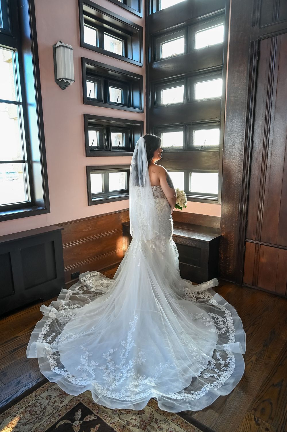 At GatsbyJones Beach, Long Island, with a indoor bride portrait by Deja Vu Studios