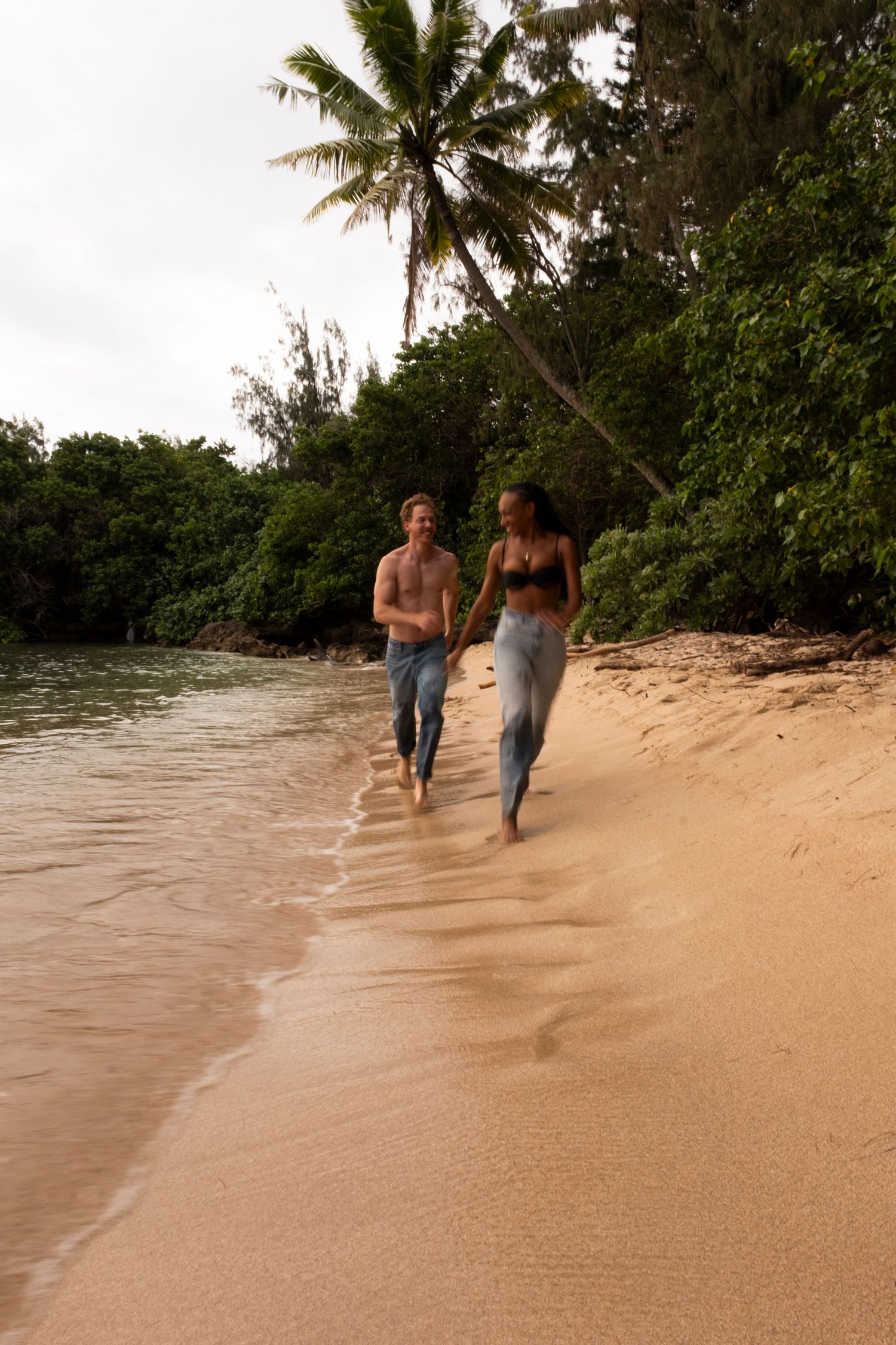 Couple sharing a romantic moment during a North Shore Oahu couples photography session.