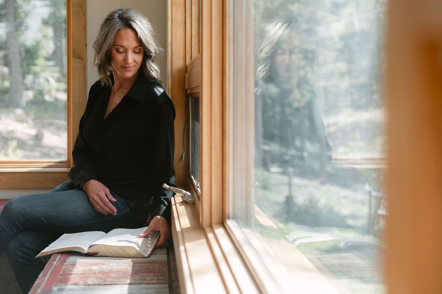 Lifestyle branding photo of Colorado photographer in natural light, calm and reflective moment