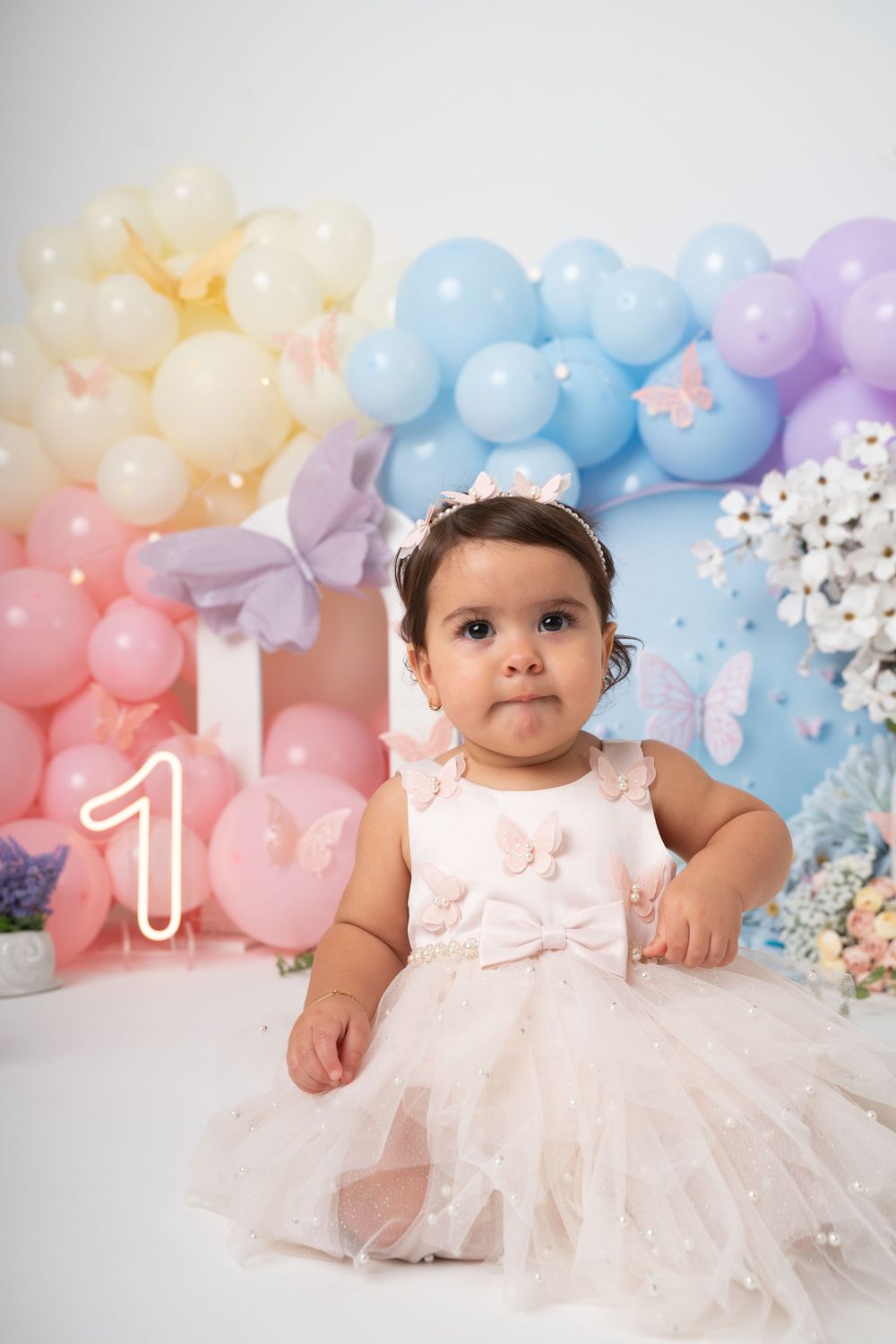 Elegant cake smash photoshoot in New Jersey studio with neutral and timeless setup
