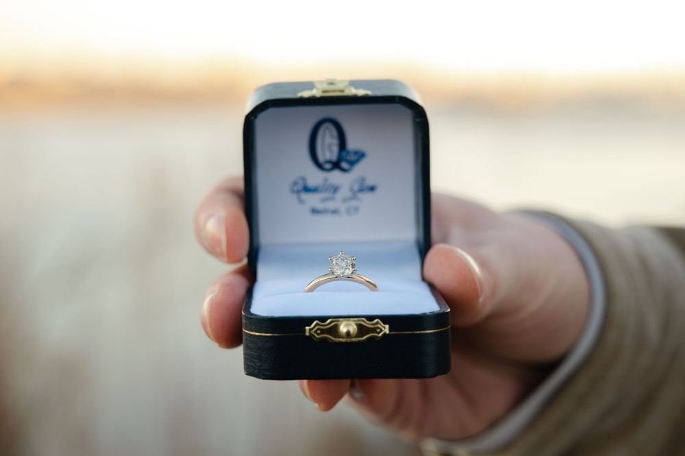 A photo showing off an engagement ring in a jewelry box during a proposal in New Jersey.