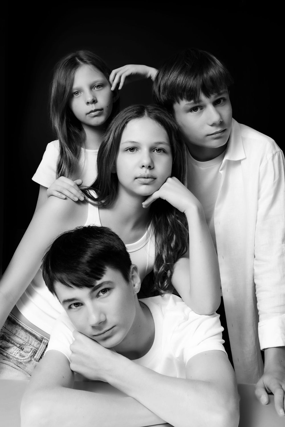 black and white portrait of four teenagers two girls and two boys Nashville studio photography