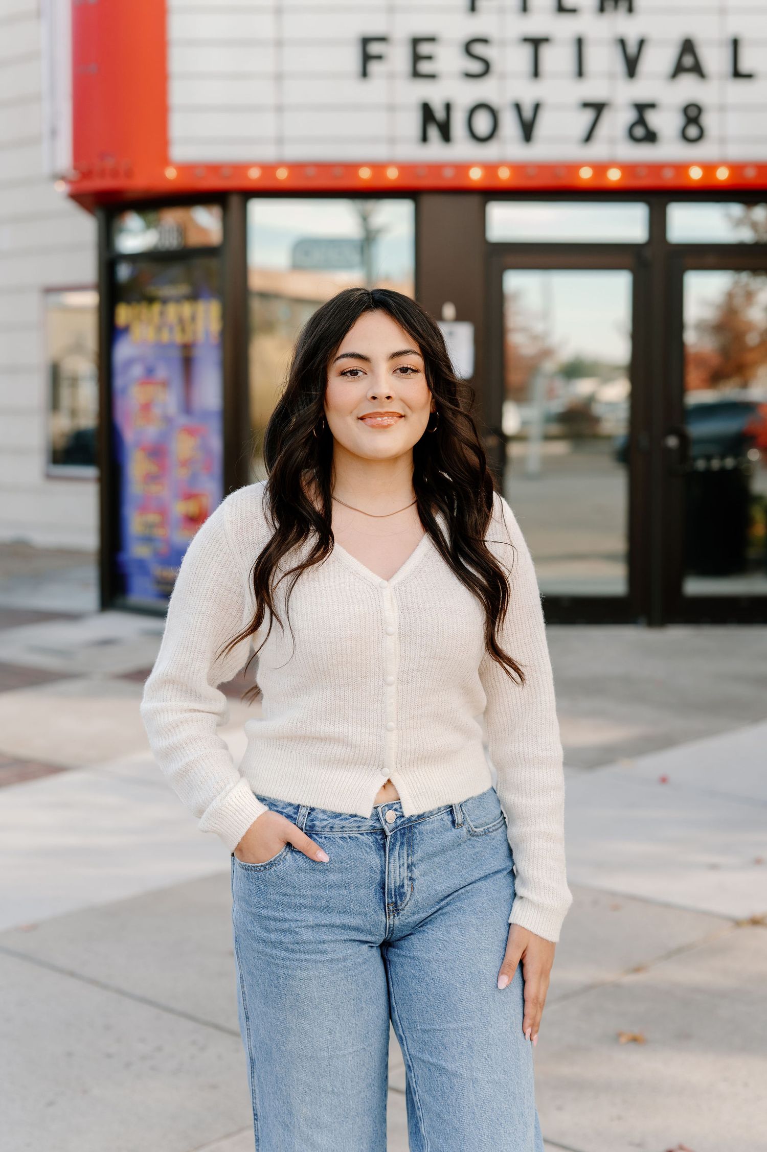 Downtown senior pictures in front of an old theater in Richland, WA