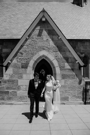 A sequence of wedding photos showing a couple exiting a stone church doorway in black and white.