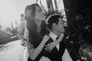 A romantic black and white wedding photo collage showing couples embracing and kissing during their special moments.