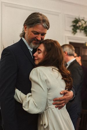 hugging in the ceremony at Weybridge register office