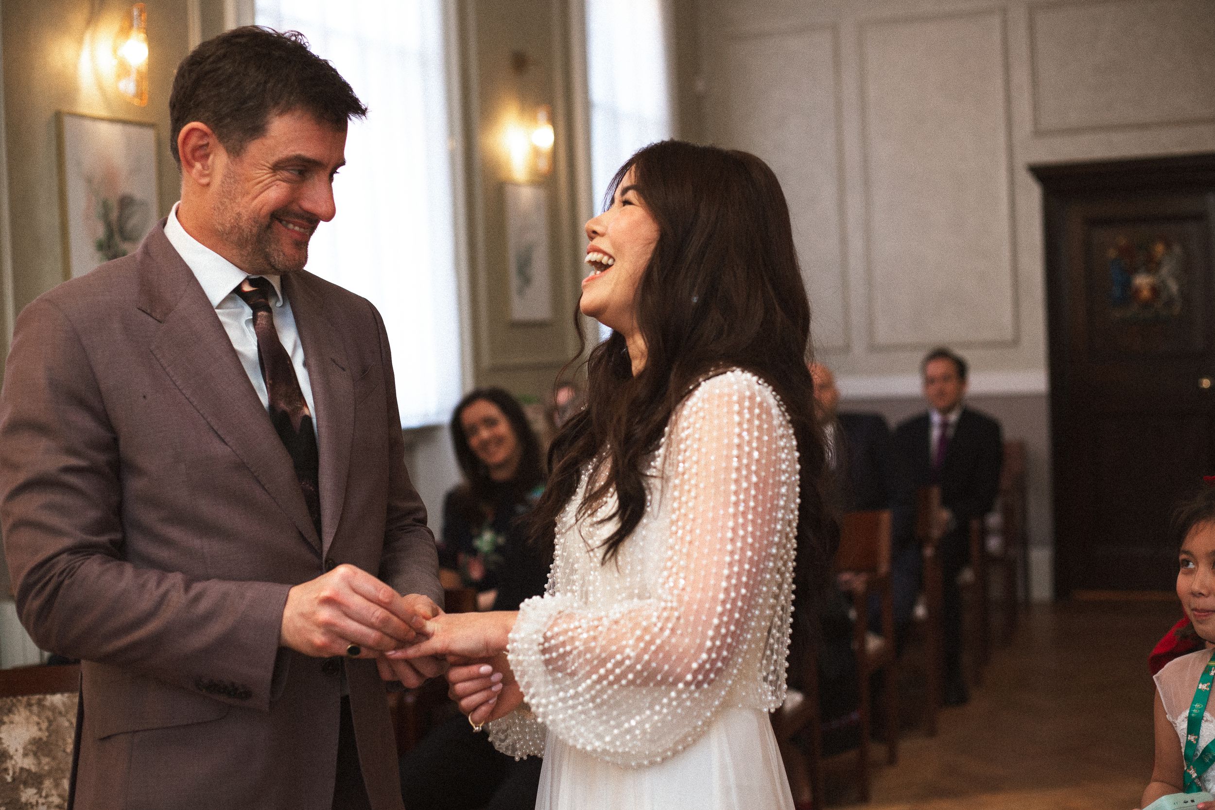 exchanging of rings at Chelsea Old Town Hall