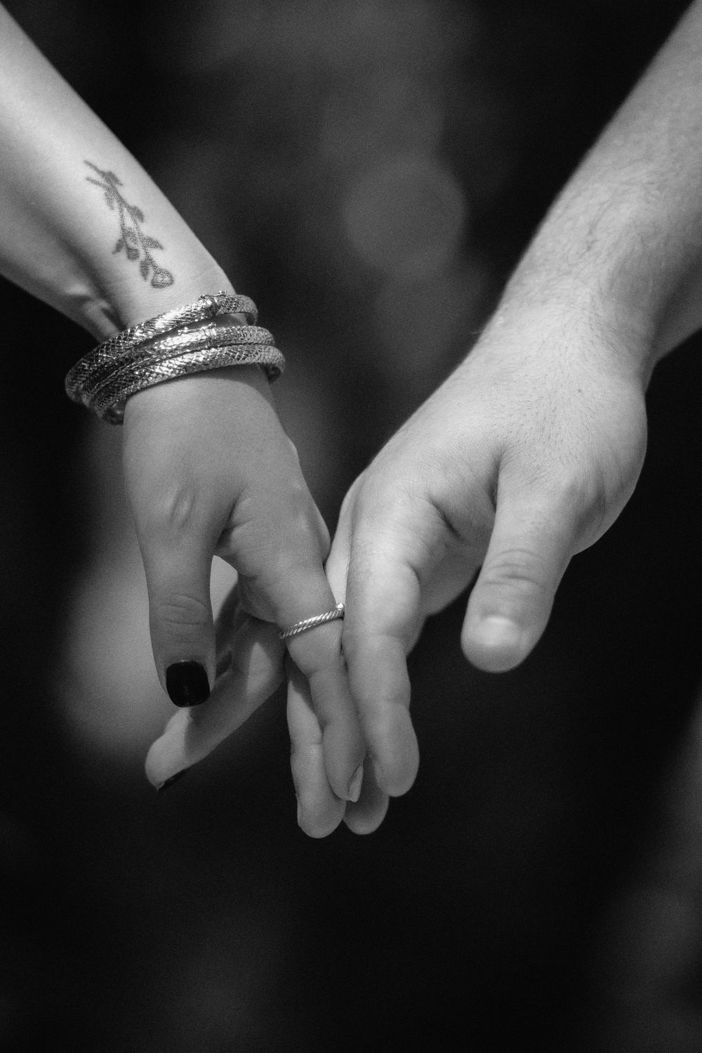 Couple holding hands at Kendall Indian Hammocks Park Miami during engagement couples session.