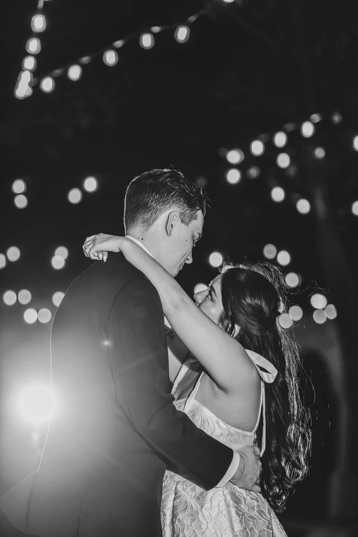 a private last dance in the twinkling lights