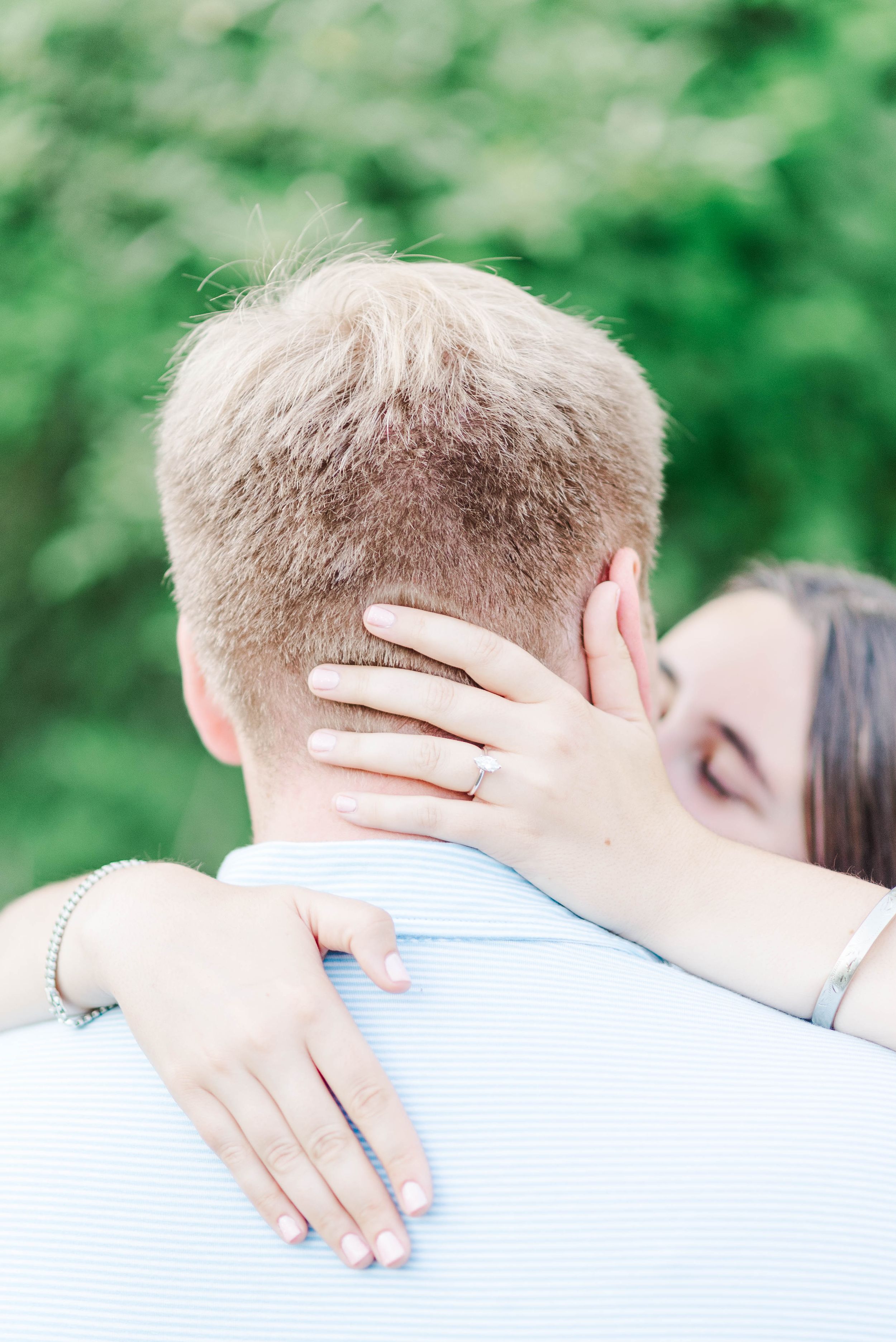 Engagement session at Quemahoning Reservoir in Western Pennsylvania, close up of engagement ring with hands on head