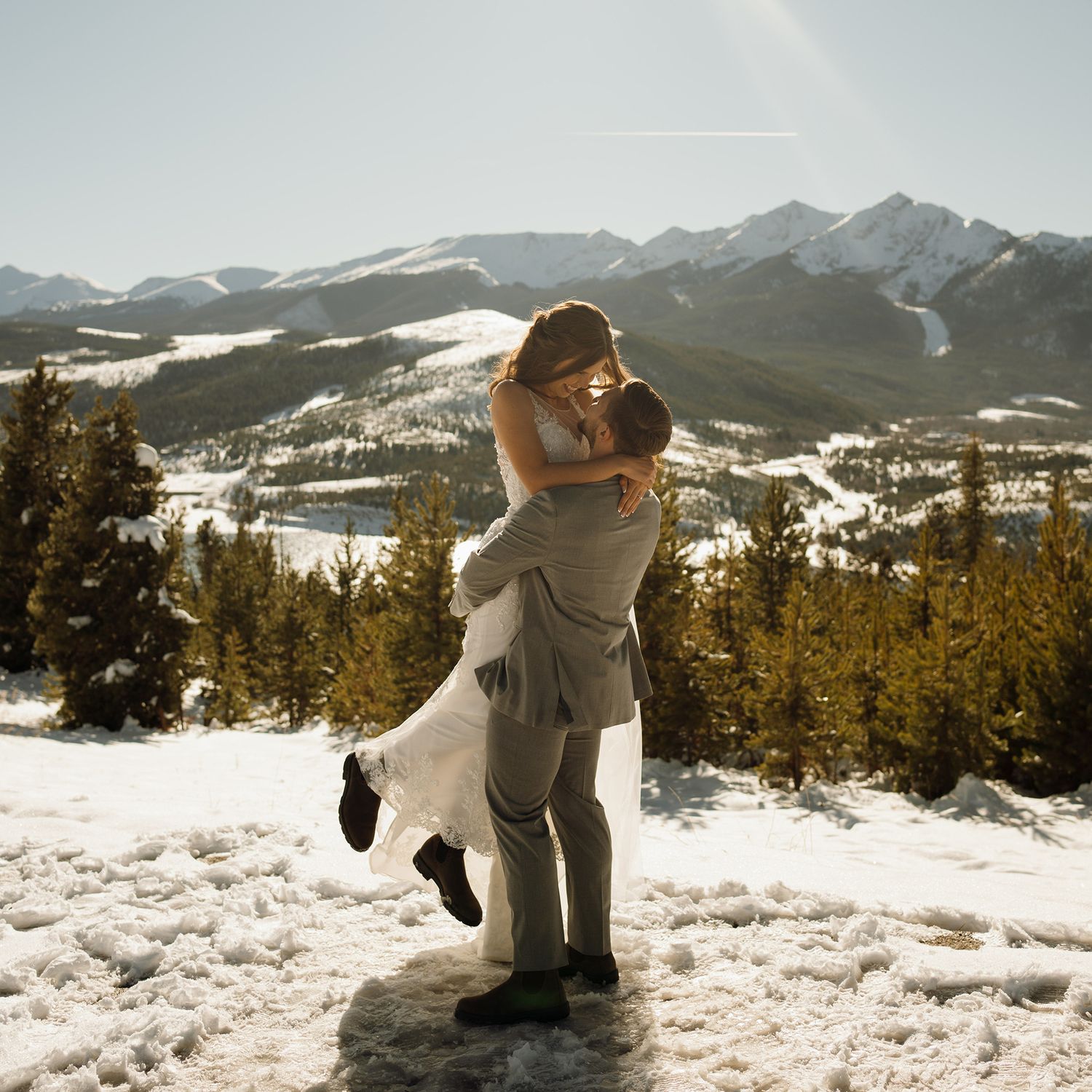 A wedding photo in the snowy mountains