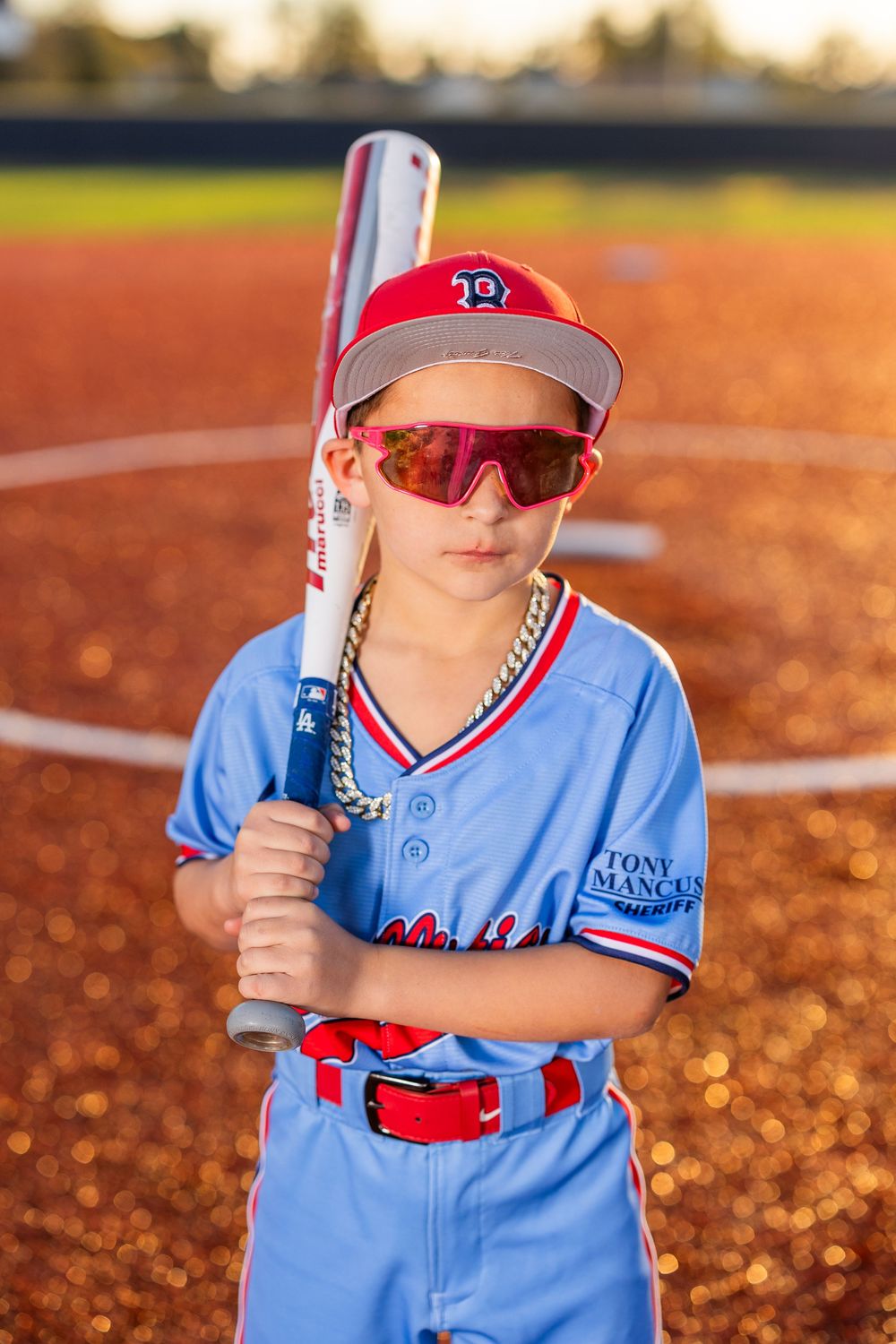 Youth baseball portrait using off-camera flash during a team media day in Lake Charles, LA. Ballistics at Westlake High School Field