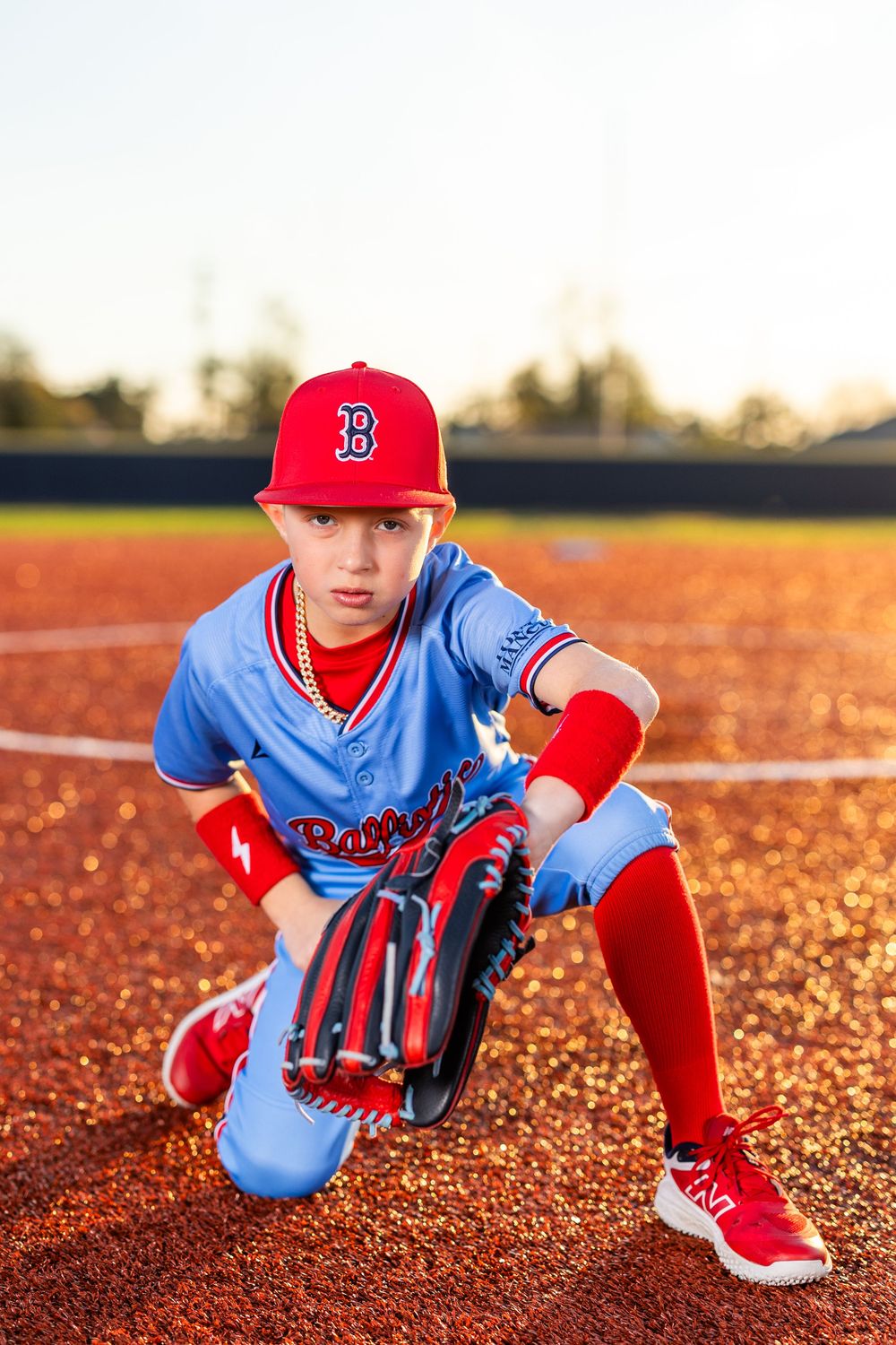 Youth baseball portrait using off-camera flash during a team media day in Lake Charles, LA. Ballistics at Westlake High School Field