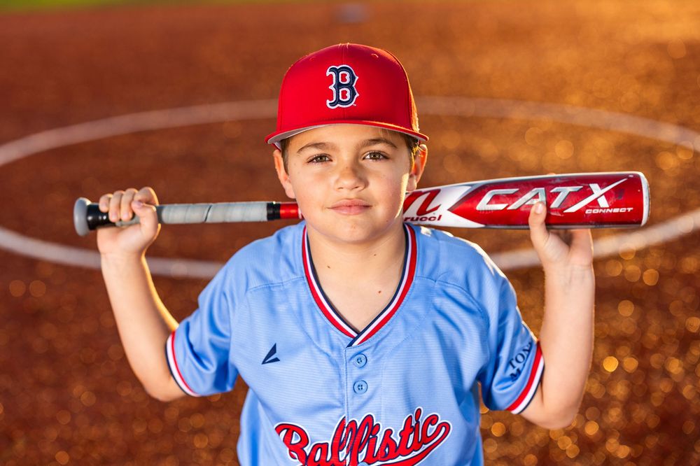 Youth baseball portrait using off-camera flash during a team media day in Lake Charles, LA. Ballistics at Westlake High School Field