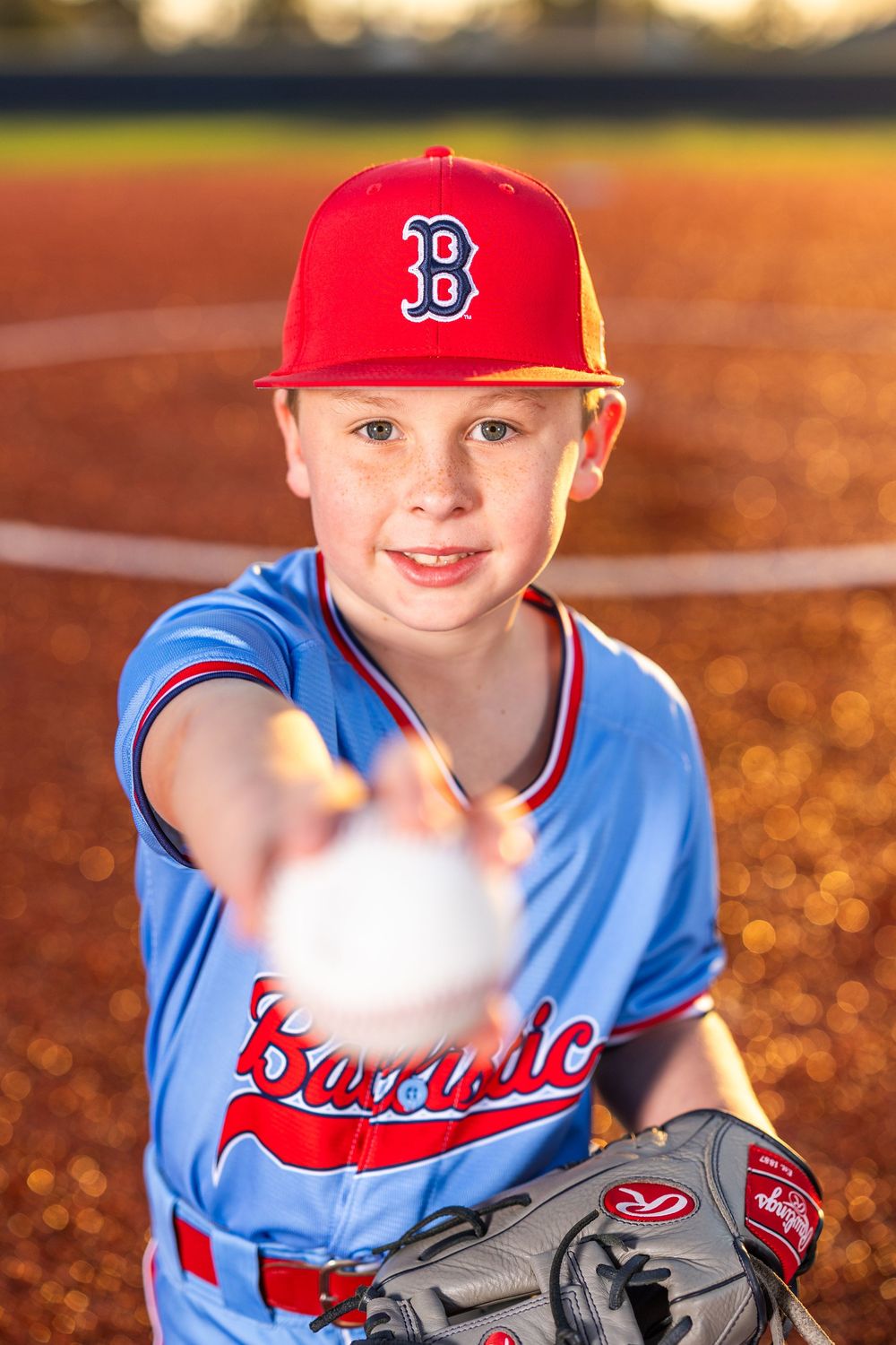 Youth baseball portrait using off-camera flash during a team media day in Lake Charles, LA. Ballistics at Westlake High School Field