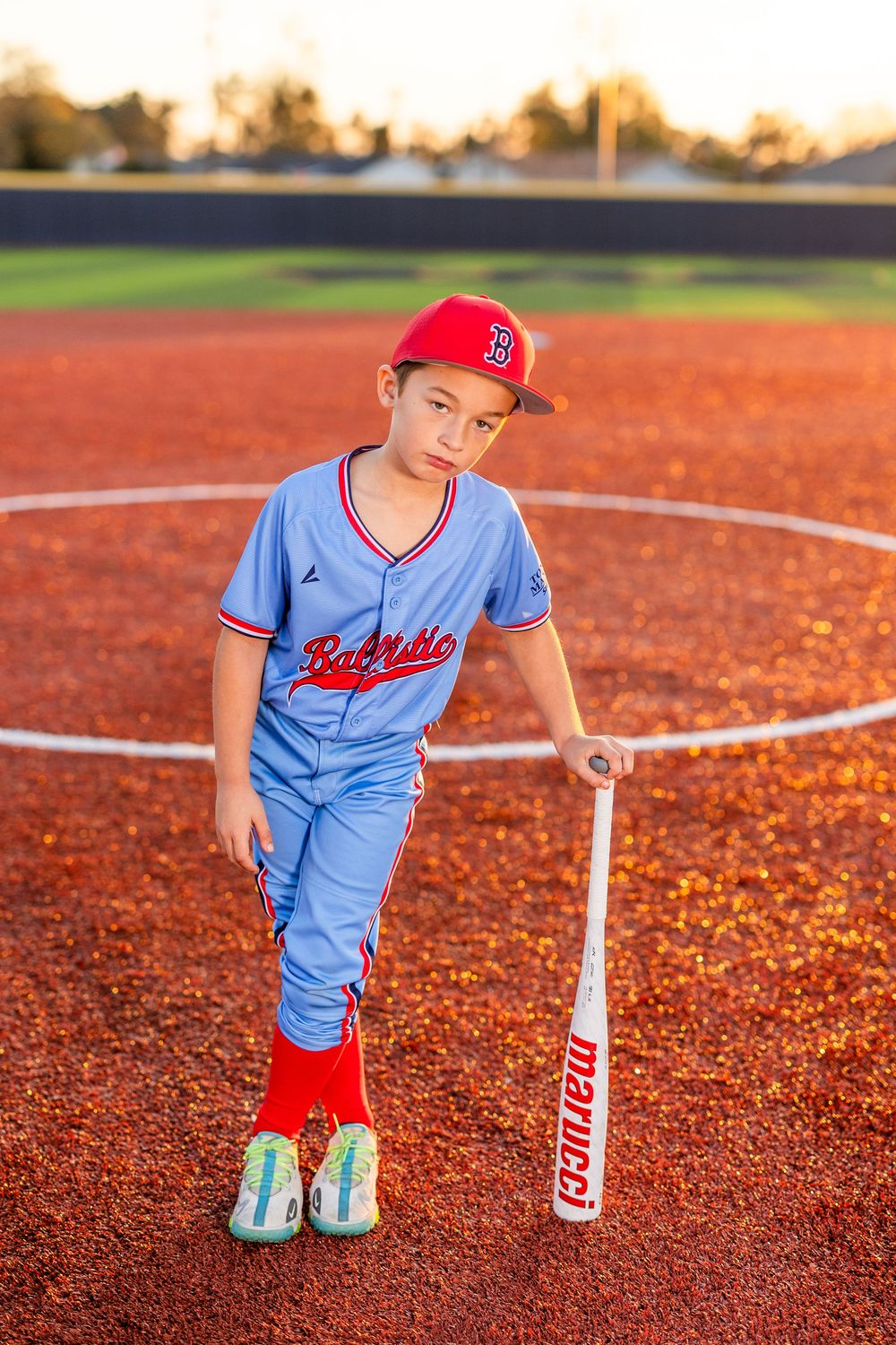 Youth baseball portrait using off-camera flash during a team media day in Lake Charles, LA. Ballistics at Westlake High School Field
