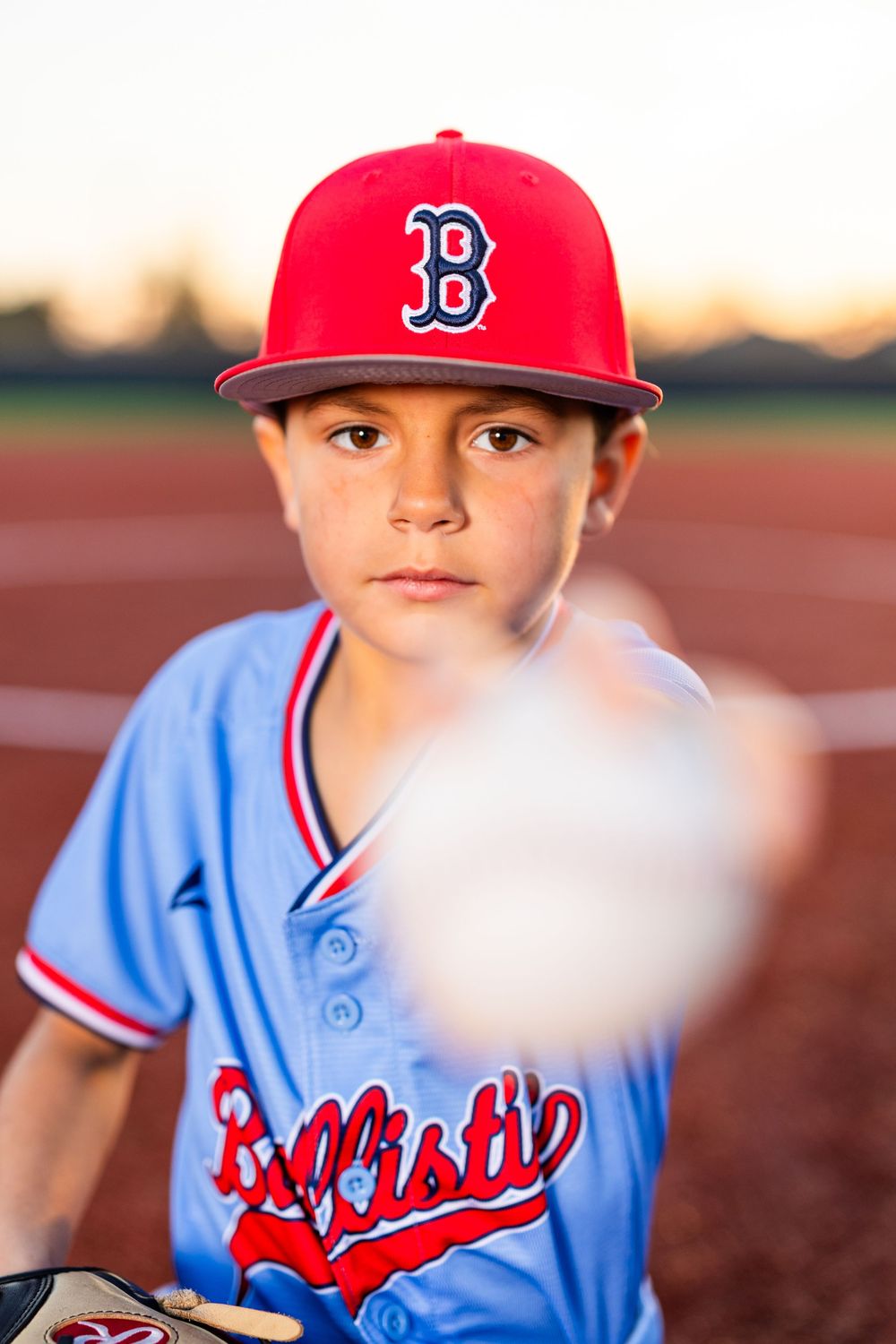 Youth baseball portrait using off-camera flash during a team media day in Lake Charles, LA. Ballistics at Westlake High School Field