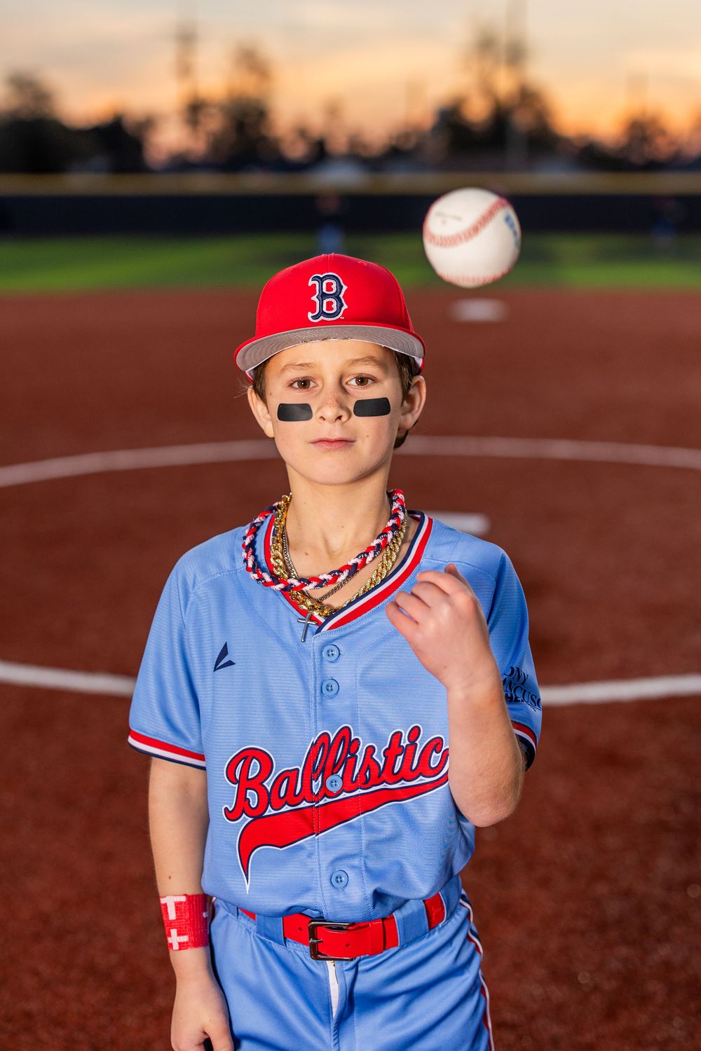 Youth baseball portrait using off-camera flash during a team media day in Lake Charles, LA. Ballistics at Westlake High School Field