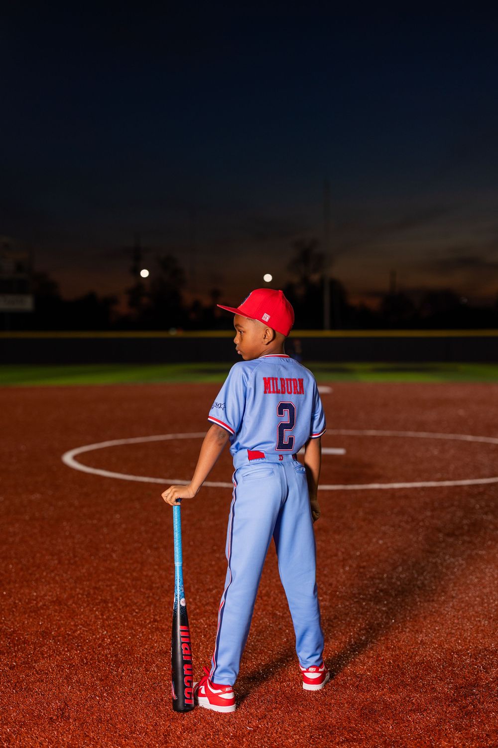 Youth baseball portrait using off-camera flash during a team media day in Lake Charles, LA. Ballistics at Westlake High School Field
