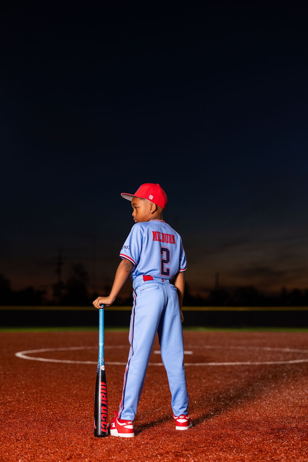 Youth baseball portrait using off-camera flash during a team media day in Lake Charles, LA. Ballistics at Westlake High School Field
