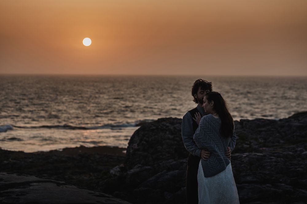 Couple enjoying final sunset moments after Cliffs of Moher elopement along the Wild Atlantic Way