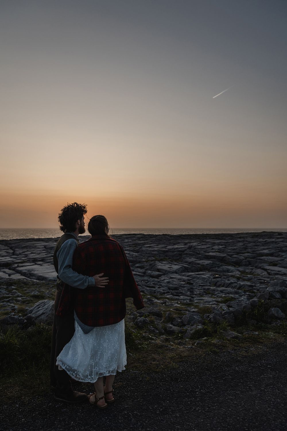 American couple finishing their Ireland elopement with sunset portraits along the Burren coastline