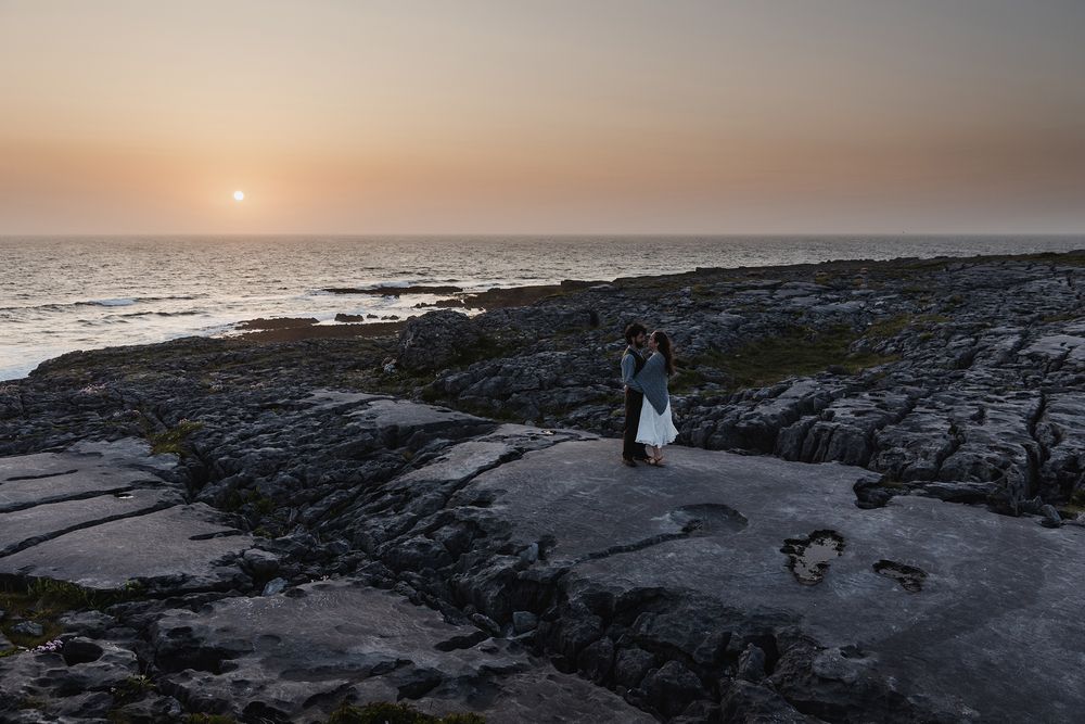 Couple enjoying final sunset moments after Cliffs of Moher elopement along the Wild Atlantic Way