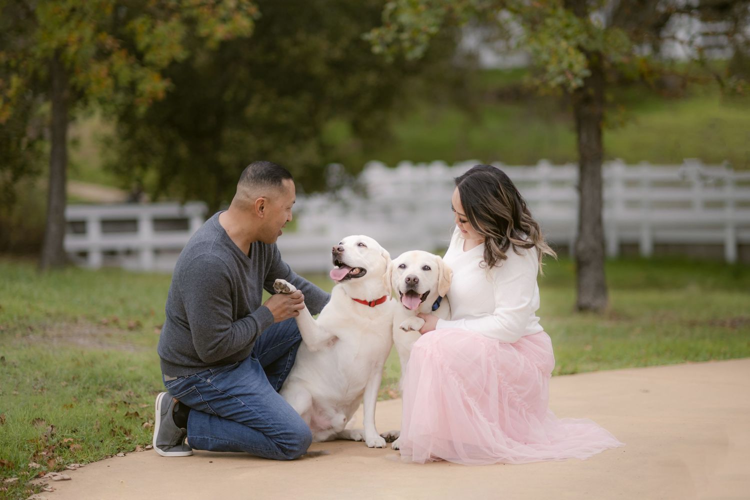 A person and a white dog wearing a pink tutu pose together in a series of outdoor photos on a path.